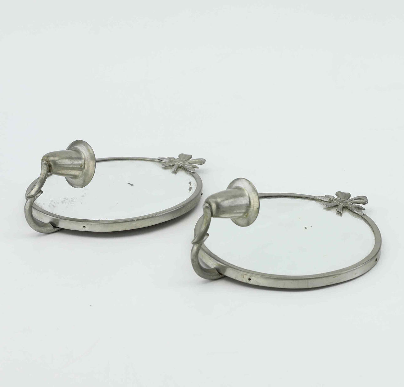 Close view of pewter candle sconces