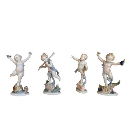 Set of 4 Vintage German Porcelain Cherub Figurines