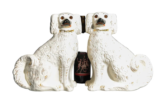 Pair of antique Staffordshire King Charles spaniel dogs with glass eyes