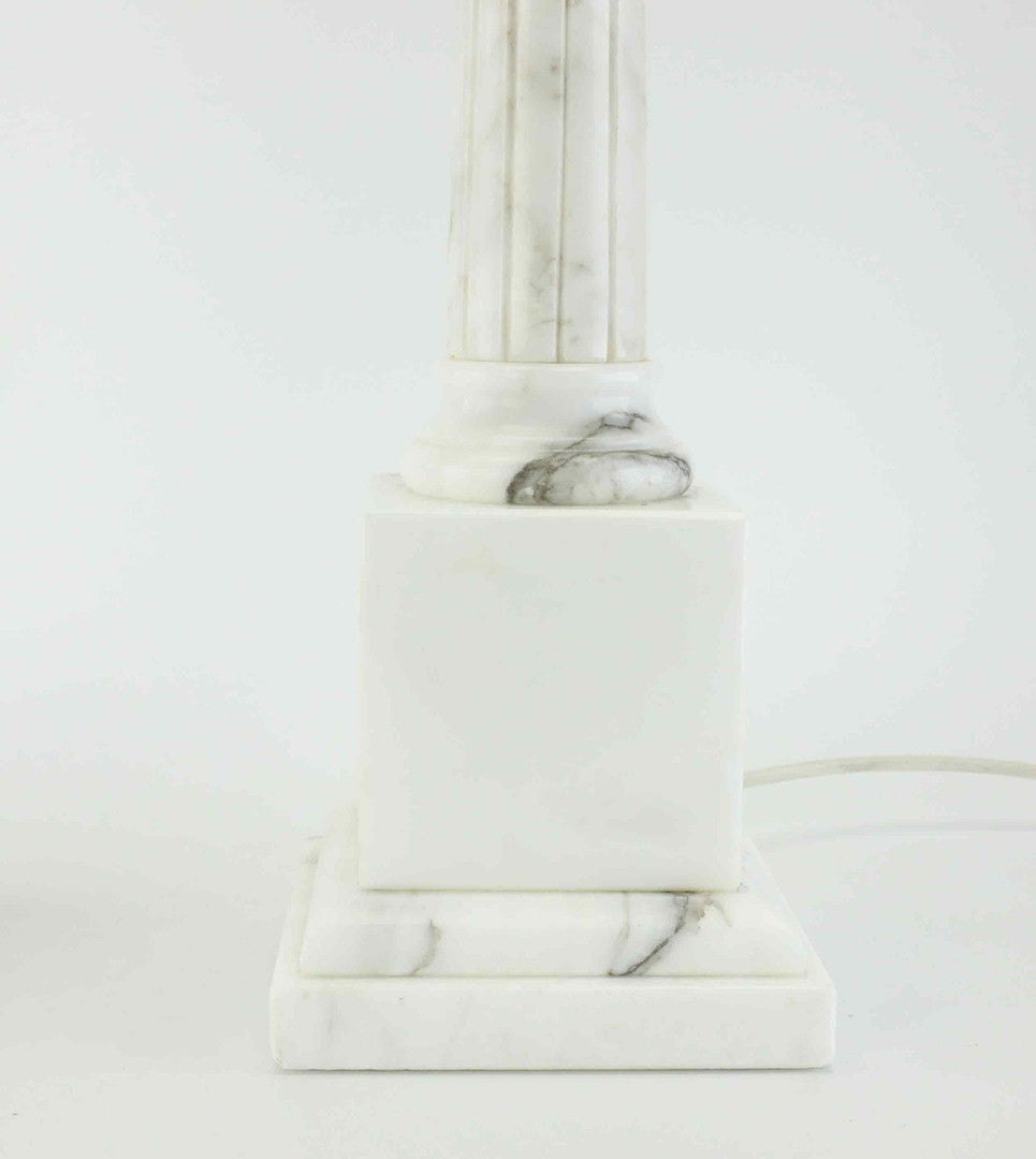 Base detail of vintage marble column table lamp