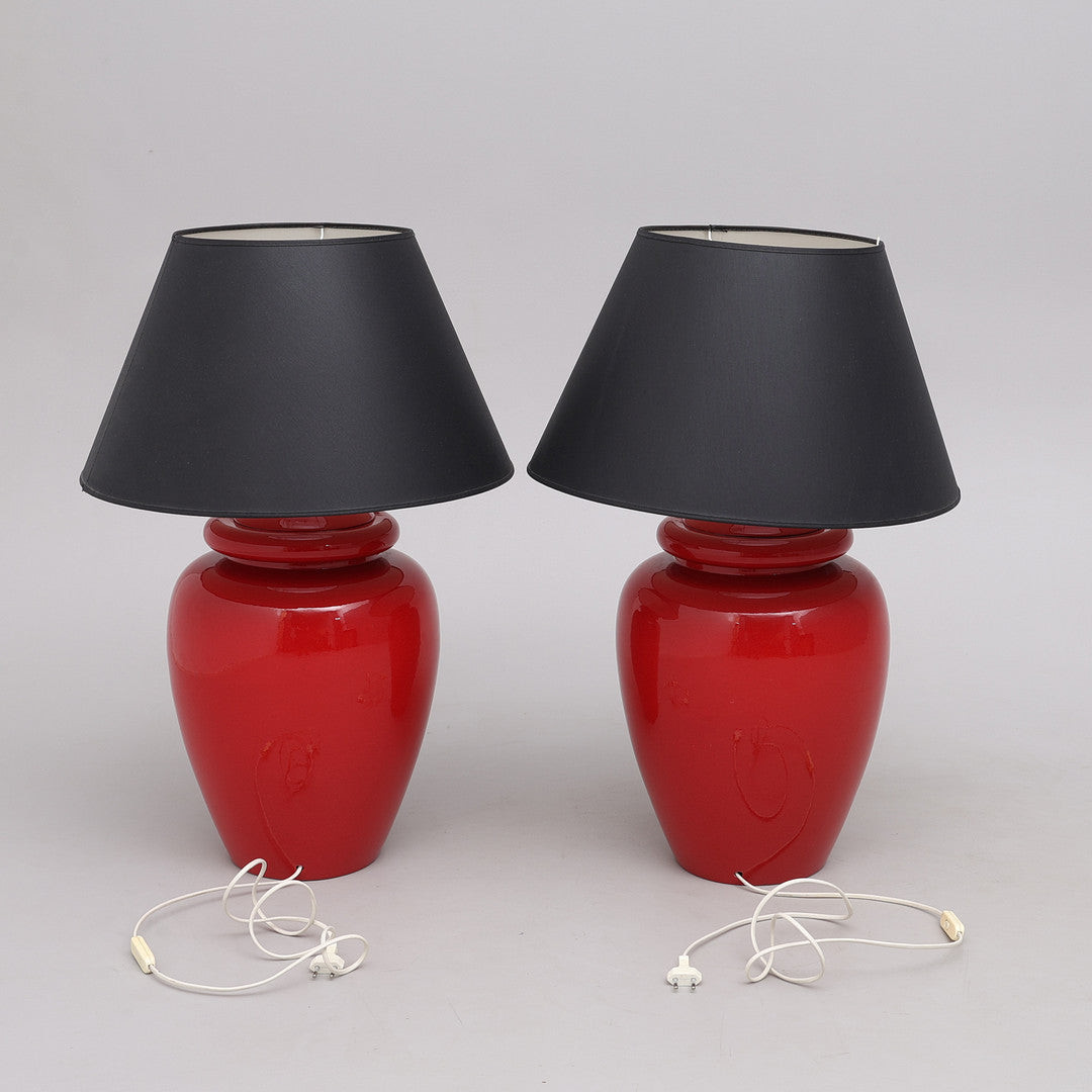 Rear view of red Kostka table lamps with cords