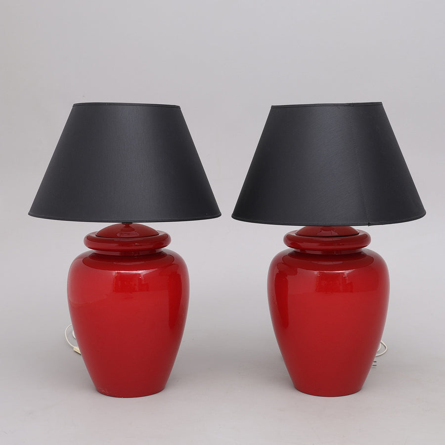 Pair of red glazed ceramic table lamps by Kostka France with black shades