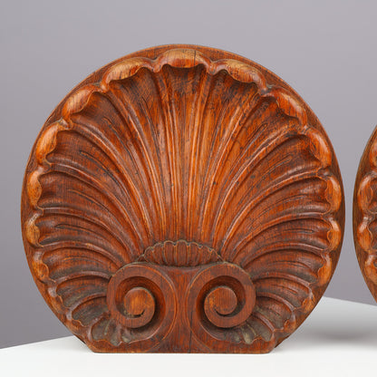 Pair of Danish carved oak scallop shell architectural ornaments
