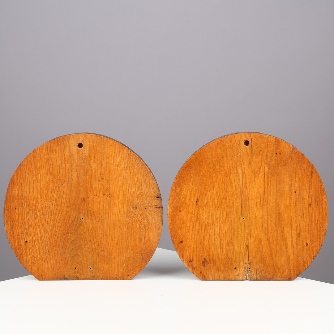 Back view of pair of Danish carved oak shell ornaments