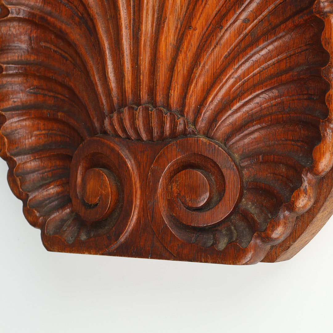 Carved scroll detail on Danish oak shell ornament