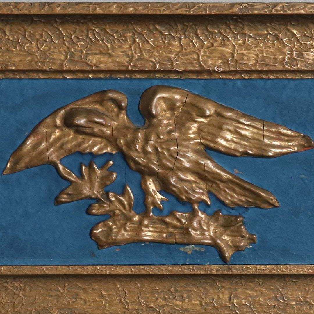 Detail of Swedish Gustavian style painted wood mirror frame and glass