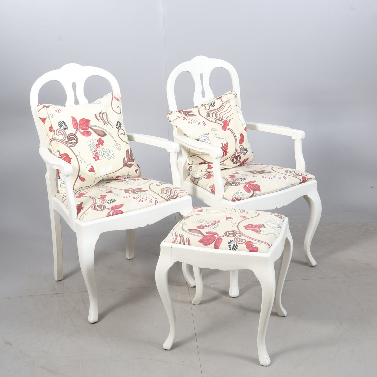 Pair of Rococo style armchairs with matching stool