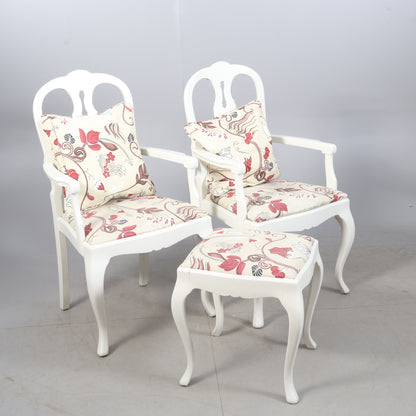 Pair of Rococo style armchairs with matching stool