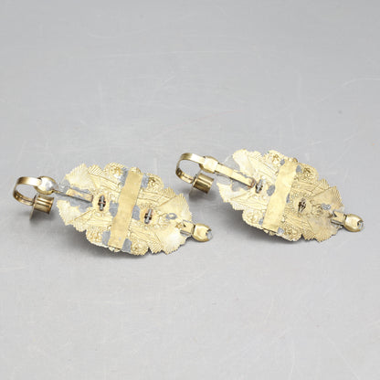 Pair of Candle Sconces Made from Military Cap Badges, 20th Century