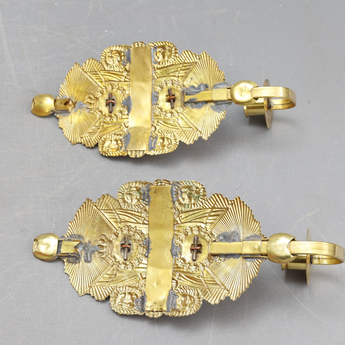 Pair of Wall Sconces Made from Military Cap Badges