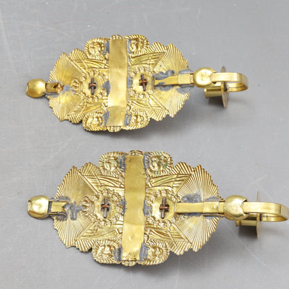 Pair of Wall Sconces Made from Military Cap Badges