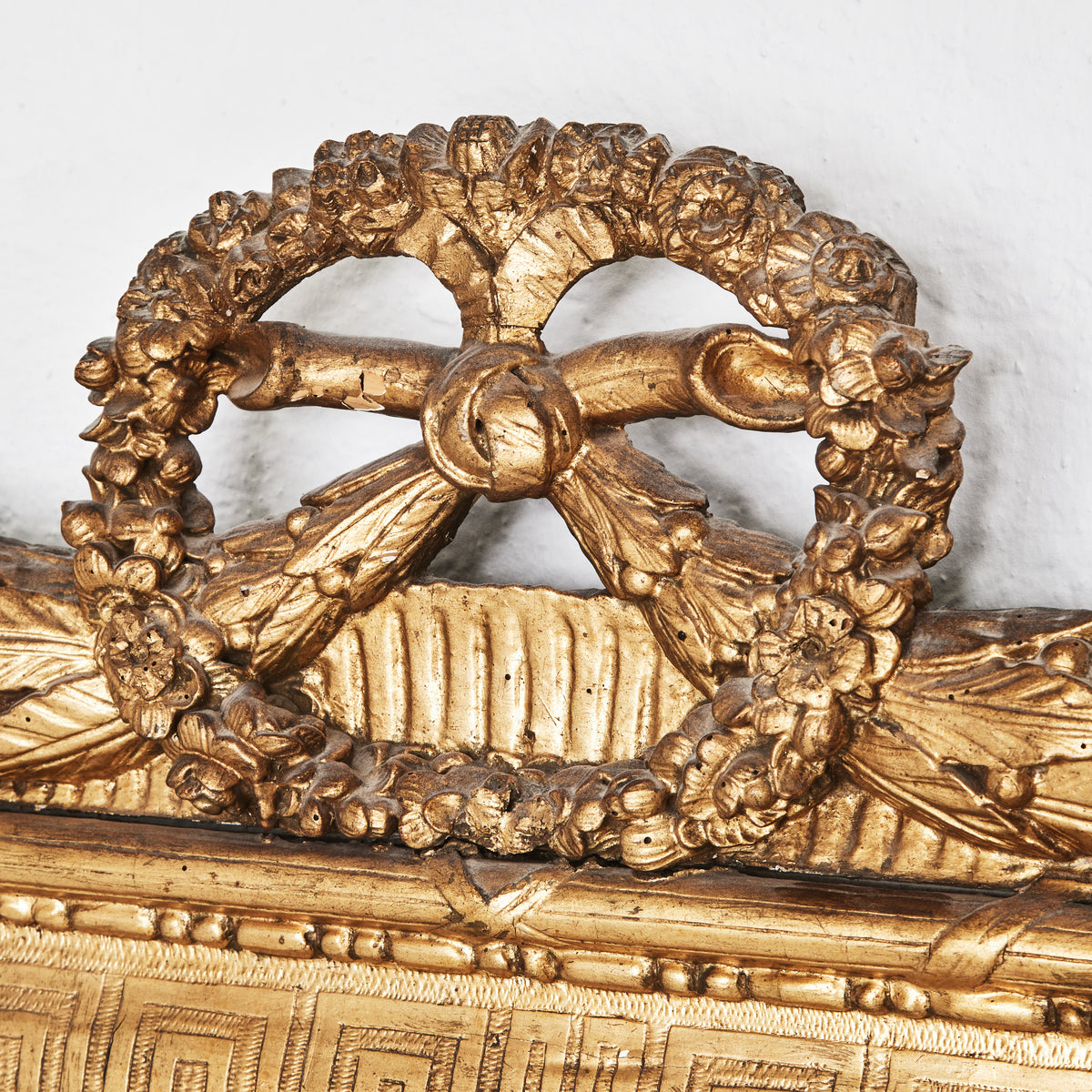 Northern European Carved and Bronzed Mirror with Laurel Festoons, 18th Century
