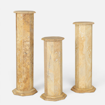 Set of three Italian travertine octagonal pedestals