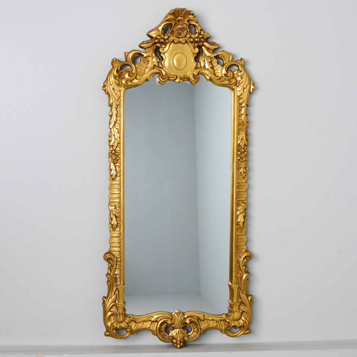 Tall Rococo style giltwood mirror