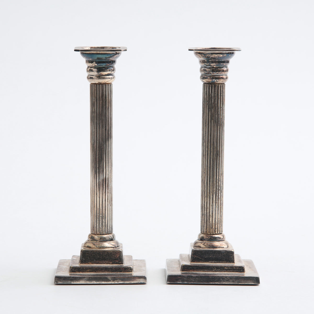 Pair of Gustavian style silver plate column candlesticks