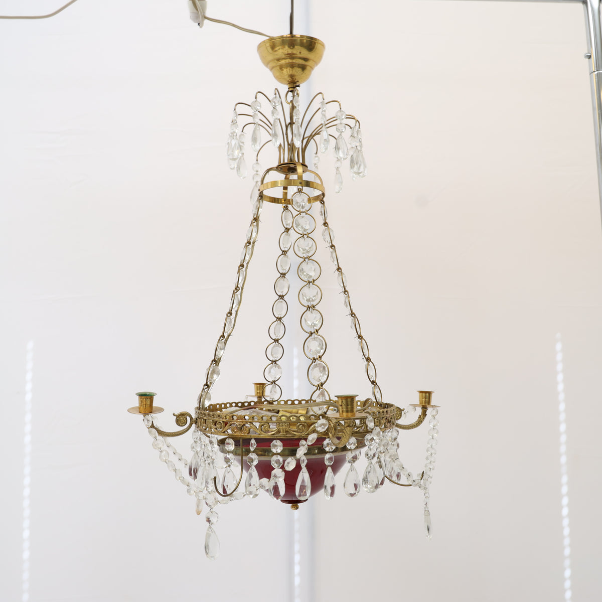 Gustavian style chandelier with red tinted glass