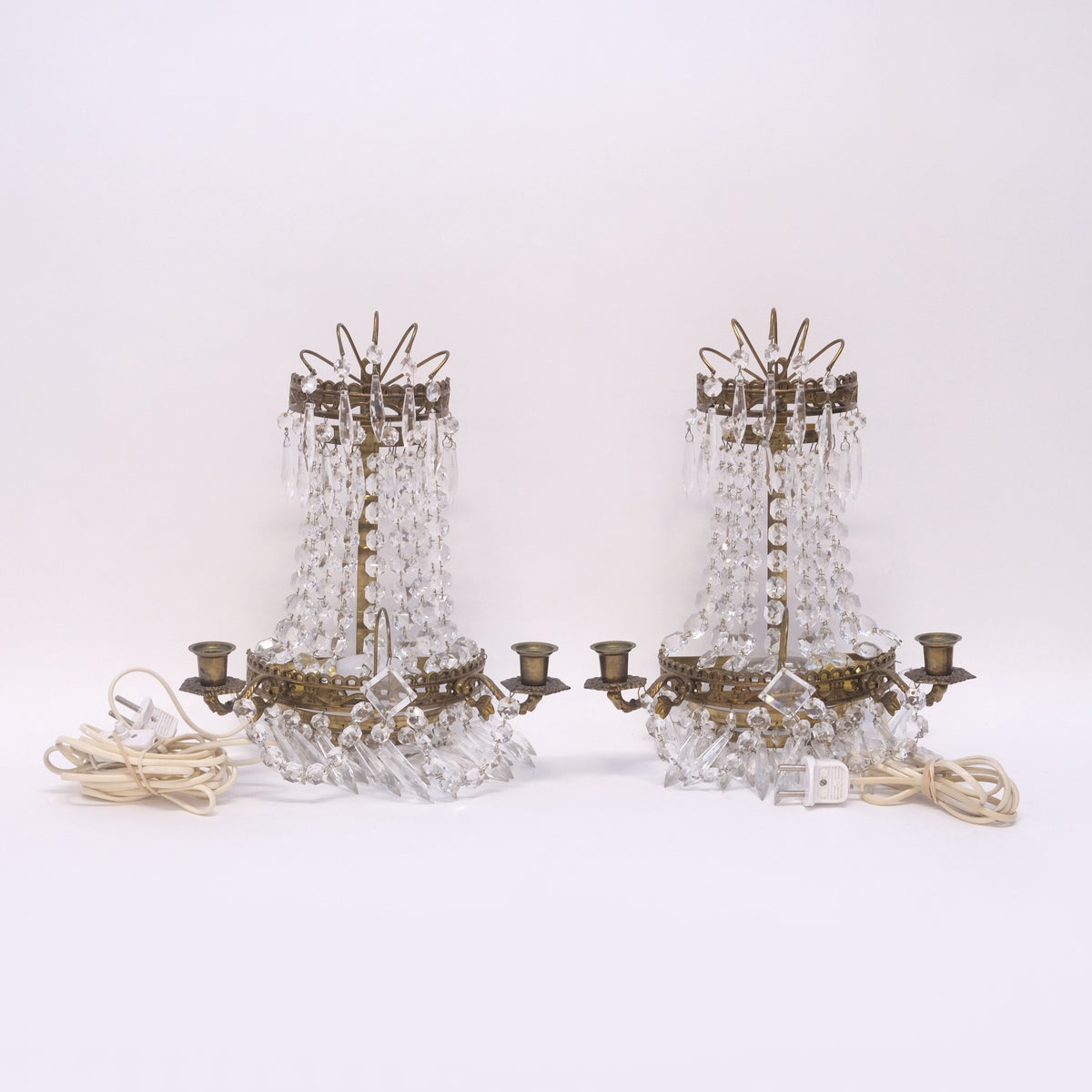 Pair of brass and crystal prism wall sconces