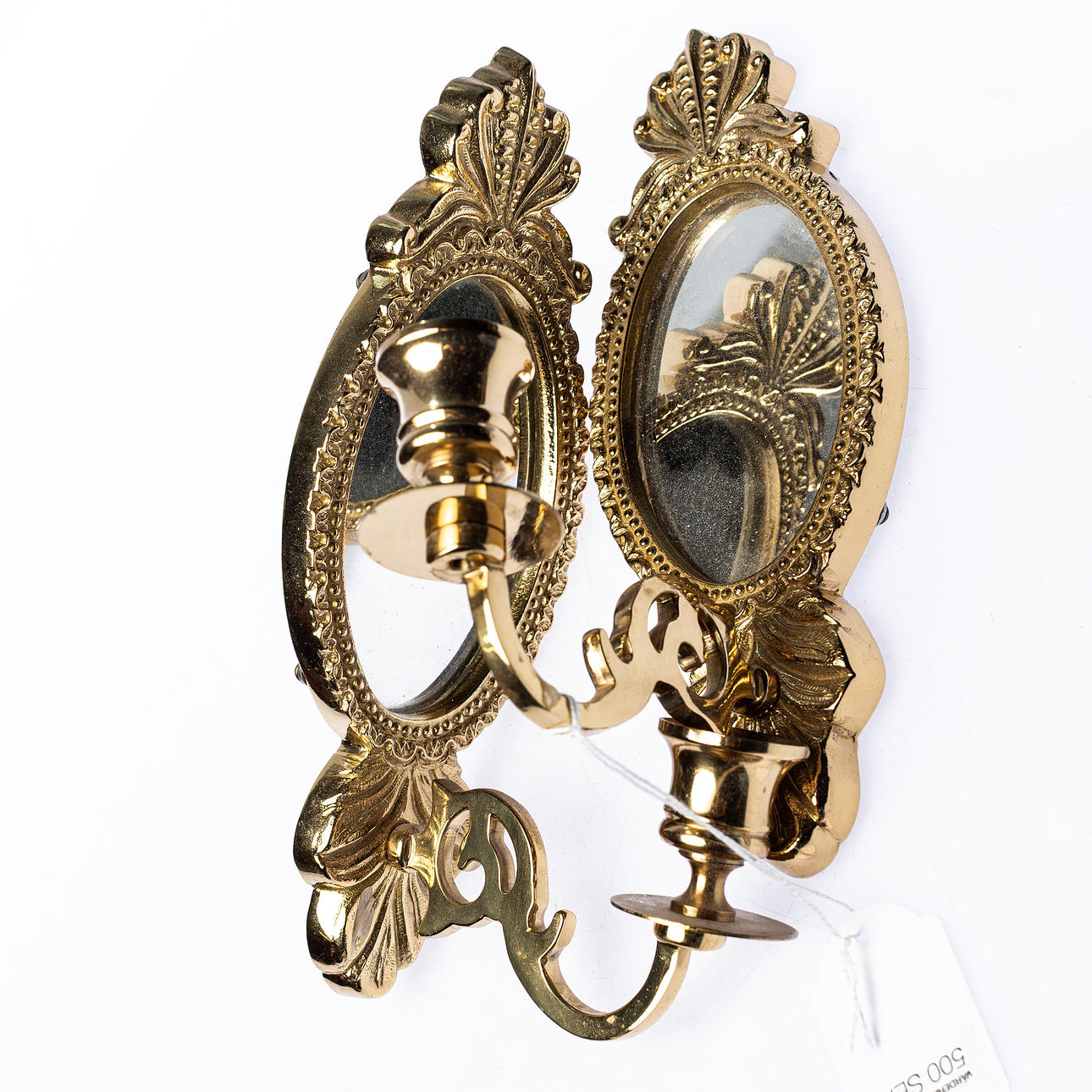 Close-up of Gustavian style mirror sconces