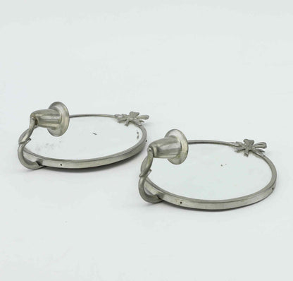 Close view of pewter candle sconces
