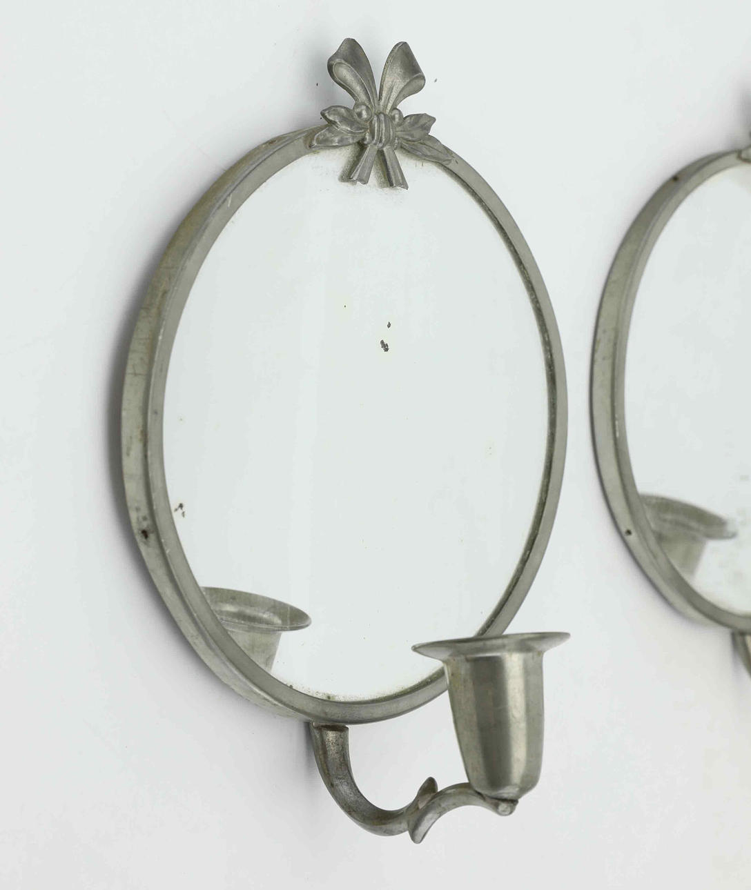 Detail of Swedish Grace pewter candle sconces