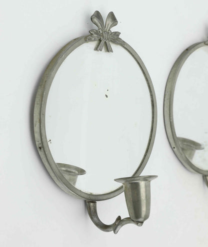 Detail of Swedish Grace pewter candle sconces