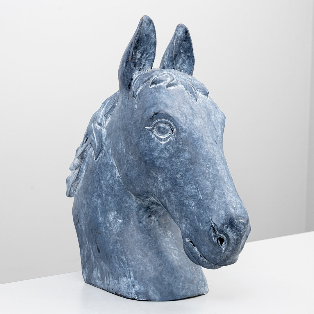 Blue gray painted horse head sculpture in carved wood, angled view