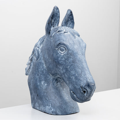 Blue gray painted horse head sculpture in carved wood, angled view