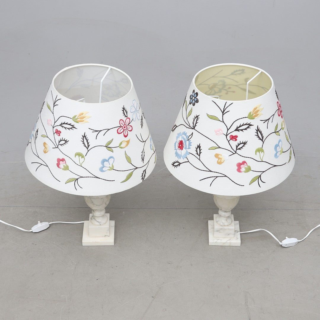 Pair of late 20th-century Italian marble table lamps shown with floral shades