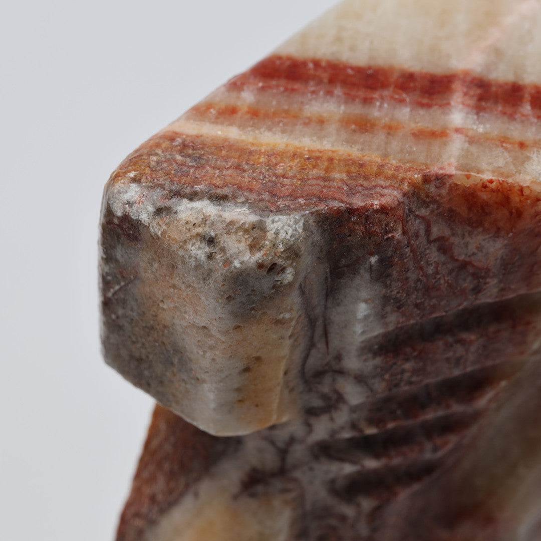 Close detail of carved stone bookend